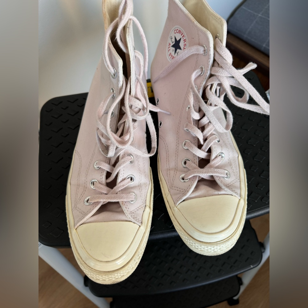 Lilac canvas Chuck 70 high tops.